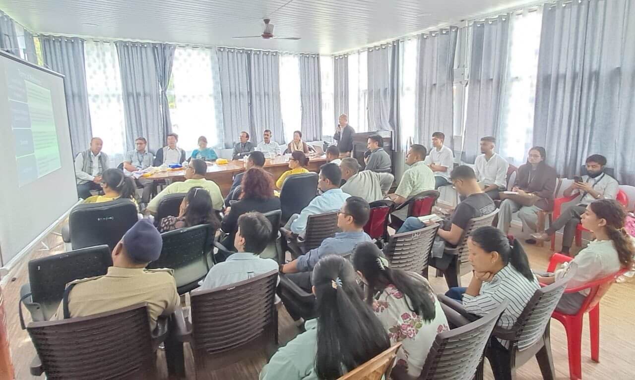 Seminar hall session with faculty and students